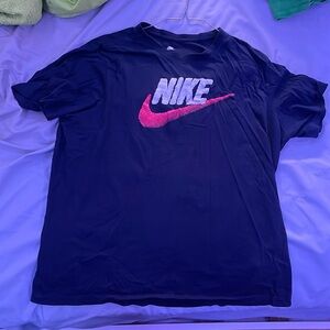 navy blue Nike tshirt, orange swoosh logo